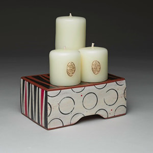 Ceramic plinth candle holder